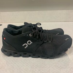 On Cloud Running Shoes. Size 9 in the color black. Worn once. Good condition.